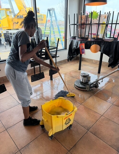 Reception desk wiped down in a modern office lobby